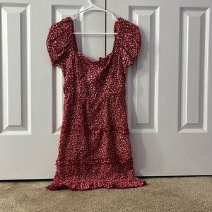 Medium red dress with flower print. Open laced back. Sim and Sam